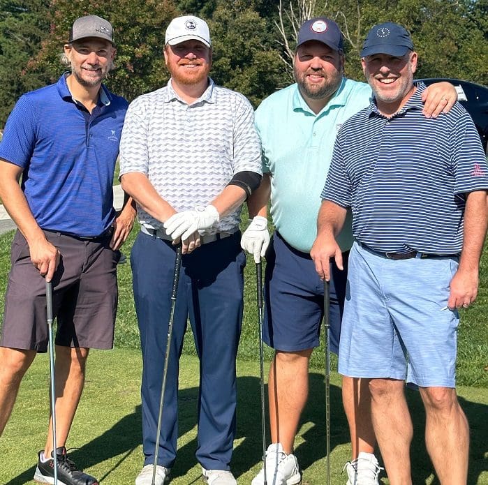Foursome of golfers at the 2023 Main Street Golf Outing