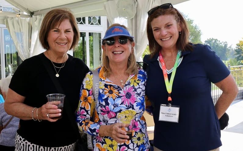 Three women enjoy Main Street's 2023 Golf Outing Cocktail Party