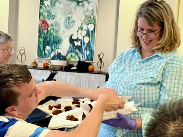 Main Street ambassador give out treats at Bake with Sharon