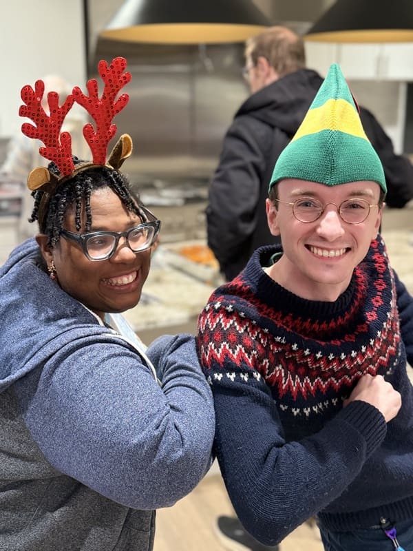 Main Street ambassador and staff member dressed up for the holidays