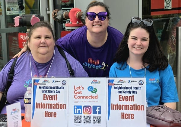 Main Street ambassador at event info table